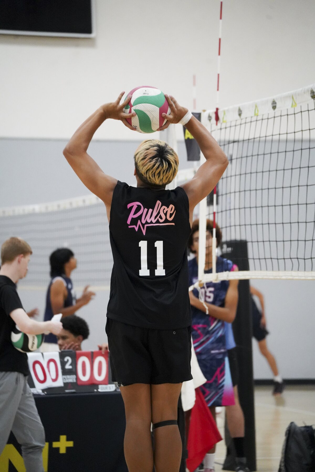 Josh setting the ball with both hands overhead